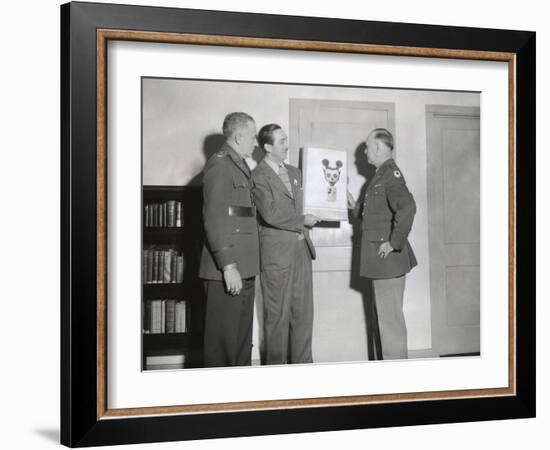 Walt Disney Showing a Sketch of Mickey Mouse Gas Mask to Chemical Warfare Officer-null-Framed Photo