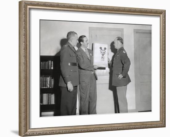 Walt Disney Showing a Sketch of Mickey Mouse Gas Mask to Chemical Warfare Officer-null-Framed Photo