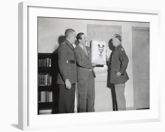 Walt Disney Showing a Sketch of Mickey Mouse Gas Mask to Chemical Warfare Officer-null-Framed Photo