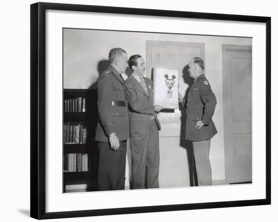 Walt Disney Showing a Sketch of Mickey Mouse Gas Mask to Chemical Warfare Officer-null-Framed Photo