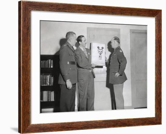 Walt Disney Showing a Sketch of Mickey Mouse Gas Mask to Chemical Warfare Officer--Framed Photo