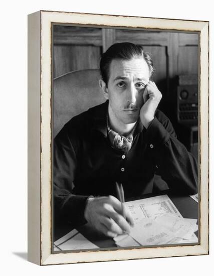 Walt Disney Sitting at His Desk-Alfred Eisenstaedt-Framed Premier Image Canvas