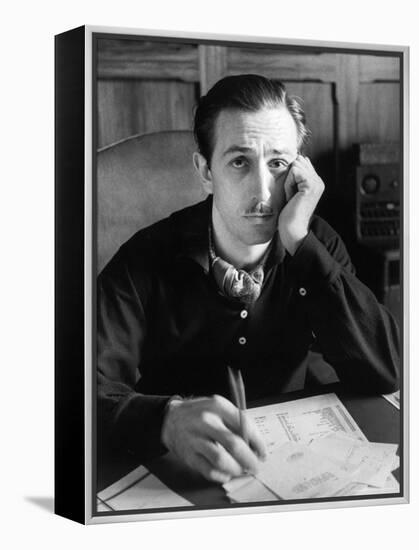 Walt Disney Sitting at His Desk-Alfred Eisenstaedt-Framed Premier Image Canvas