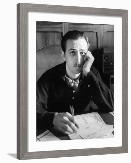 Walt Disney Sitting at His Desk-Alfred Eisenstaedt-Framed Premium Photographic Print