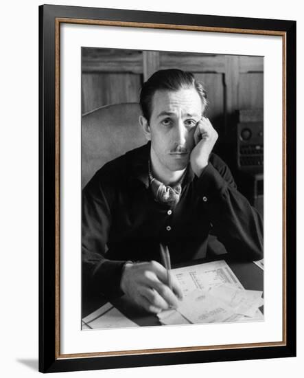 Walt Disney Sitting at His Desk-Alfred Eisenstaedt-Framed Premium Photographic Print