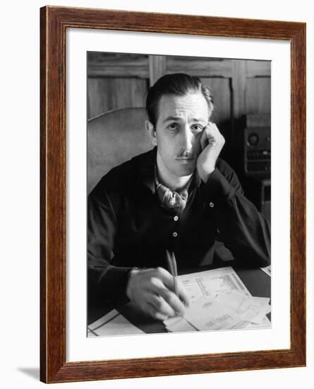 Walt Disney Sitting at His Desk-Alfred Eisenstaedt-Framed Premium Photographic Print