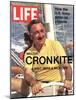 Walter Cronkite at Wheel of Boat, March 26, 1971-Leonard Mccombe-Mounted Photographic Print