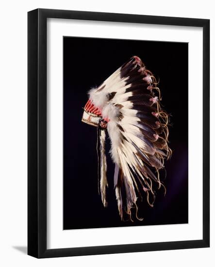 War bonnet of eagle tail feathers, each feather signifying a specific war honour-Werner Forman-Framed Giclee Print