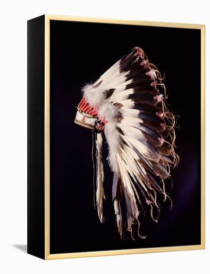 War bonnet of eagle tail feathers, each feather signifying a specific war honour-Werner Forman-Framed Premier Image Canvas