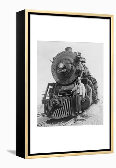 War Information Photographer Jack Delano and Train-Jack Delano-Framed Stretched Canvas