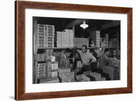 Warehouse manager M. Ogi with S. Sugimoto, manager of Co-op at Manzanar, 1943-Ansel Adams-Framed Photographic Print