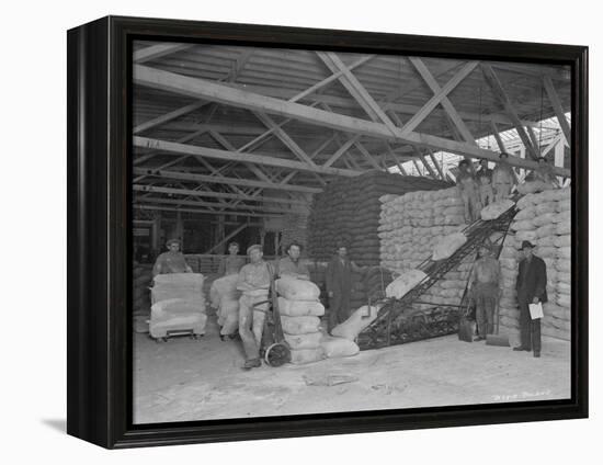 Warehouse Scene, Circa 1920s-Marvin Boland-Framed Premier Image Canvas