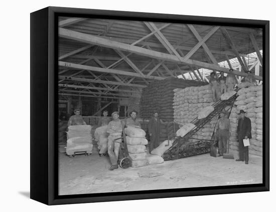 Warehouse Scene, Circa 1920s-Marvin Boland-Framed Premier Image Canvas