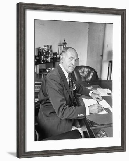 Warner Bros. Studio Chief Jack Warner Sitting at His Desk-Alfred Eisenstaedt-Framed Photographic Print