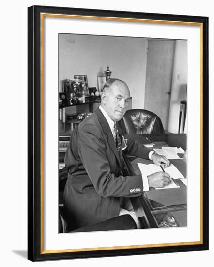 Warner Bros. Studio Chief Jack Warner Sitting at His Desk-Alfred Eisenstaedt-Framed Photographic Print