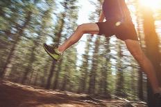 Runner Jumping on Trail Run in Forest for Marathon Fitness-warrengoldswain-Photographic Print