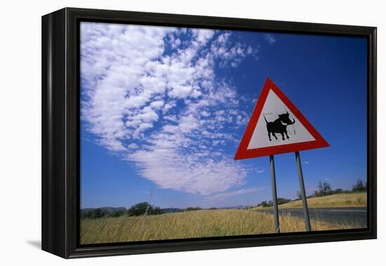 Warthog Crossing Sign-Paul Souders-Framed Premier Image Canvas
