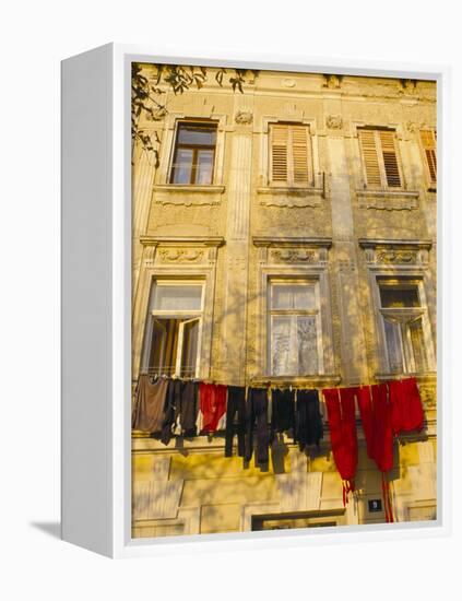 Washing Line of Colourful Laundry in Old Town Buzet, Hilltop Village, Buzet, Istria, Croatia-Ken Gillham-Framed Premier Image Canvas