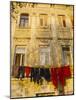 Washing Line of Colourful Laundry in Old Town Buzet, Hilltop Village, Buzet, Istria, Croatia-Ken Gillham-Mounted Photographic Print