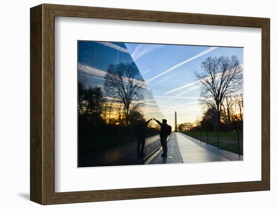 Washington DC - A Veteran Looks for a Name at Vietnam Veterans Memorial Wall at Sunrise-Orhan-Framed Photographic Print