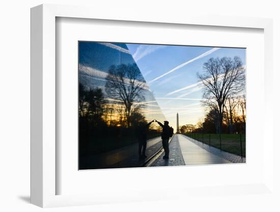 Washington DC - A Veteran Looks for a Name at Vietnam Veterans Memorial Wall at Sunrise-Orhan-Framed Photographic Print