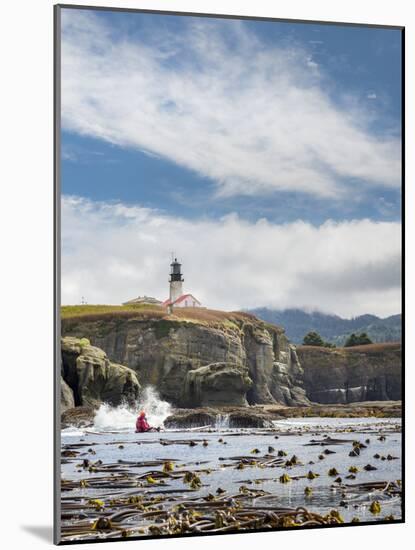 Washington, Male Sea Kayaker Paddling Along Cliffs Beneath Lighthouse on Tatoosh Island-Gary Luhm-Mounted Photographic Print