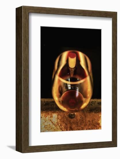 Washington State, Walla Walla. the Illusion of a Bottle Inside a Glass in a Walla Walla Winery-Richard Duval-Framed Photographic Print