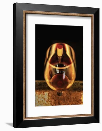 Washington State, Walla Walla. the Illusion of a Bottle Inside a Glass in a Walla Walla Winery-Richard Duval-Framed Photographic Print