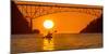 Washington, Woman Sea Kayaker Paddles before the Deception Pass Bridge at Sunset-Gary Luhm-Mounted Photographic Print