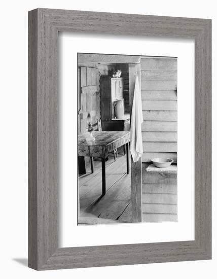 Washstand in the dog run and kitchen of sharecropper a cabin in Hale County, Alabama, c.1936-Walker Evans-Framed Photographic Print