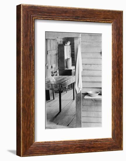 Washstand in the dog run and kitchen of sharecropper a cabin in Hale County, Alabama, c.1936-Walker Evans-Framed Photographic Print