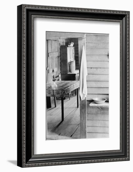 Washstand in the dog run and kitchen of sharecropper a cabin in Hale County, Alabama, c.1936-Walker Evans-Framed Photographic Print