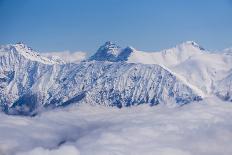 View on Winter Snowy Mountains and Blue Sky above Clouds, Krasnaya Polyana, Sochi, Russia-wasja-Photographic Print