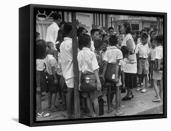 "Watchtower", Being Distributed in Streets of Bangkok-null-Framed Premier Image Canvas