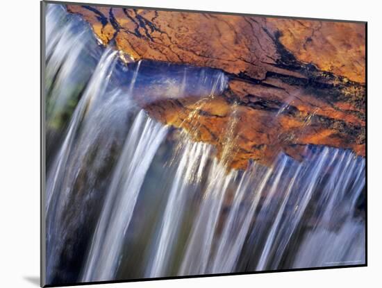 Water Cascades over Red Rock of Reynolds Creek, Glacier National Park, Montana, USA-Chuck Haney-Mounted Photographic Print