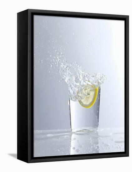 Water Splashing Out of a Glass-Karl Newedel-Framed Premier Image Canvas