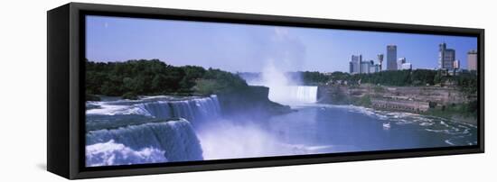 Waterfall with City Skyline in the Background, Niagara Falls, Ontario, Canada-null-Framed Premier Image Canvas