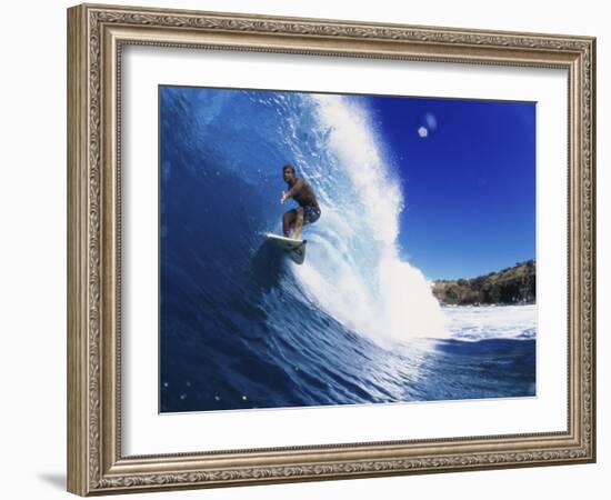 Wave Curling Up Over Surfer-null-Framed Photographic Print