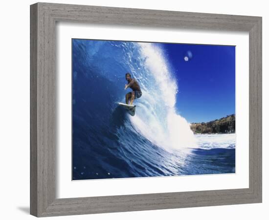 Wave Curling Up Over Surfer-null-Framed Photographic Print