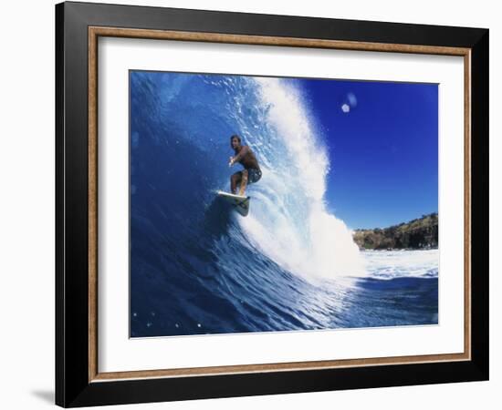 Wave Curling Up Over Surfer-null-Framed Photographic Print