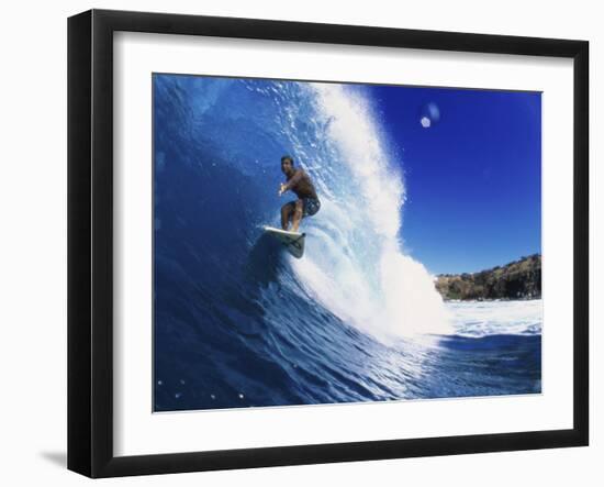 Wave Curling Up Over Surfer-null-Framed Photographic Print