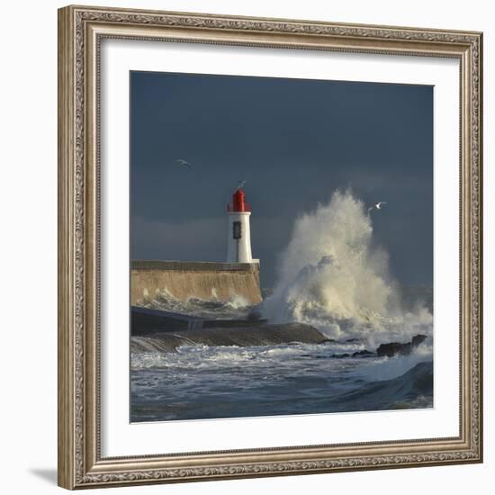 Waves breaking against port wall with lighthouse during storm-Loic Poidevin-Framed Photographic Print