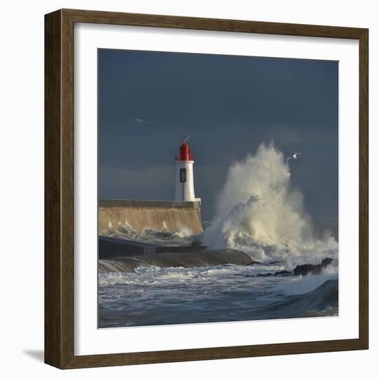 Waves breaking against port wall with lighthouse during storm-Loic Poidevin-Framed Photographic Print