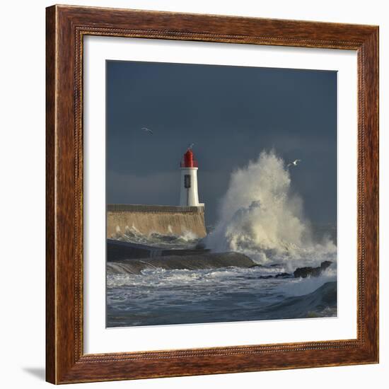 Waves breaking against port wall with lighthouse during storm-Loic Poidevin-Framed Photographic Print