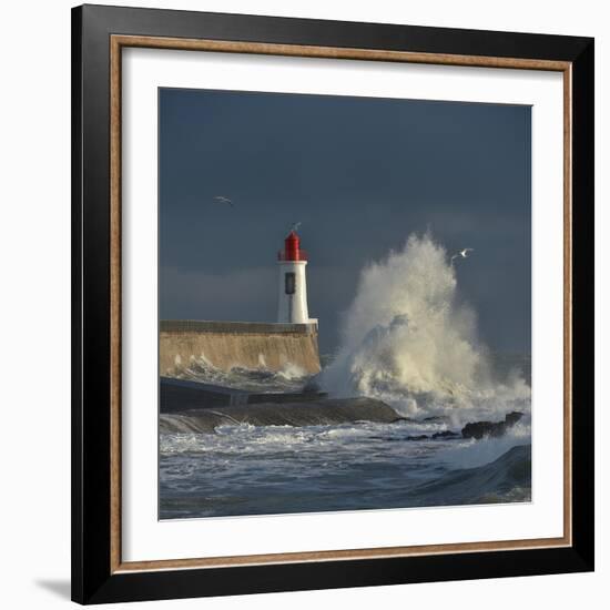 Waves breaking against port wall with lighthouse during storm-Loic Poidevin-Framed Photographic Print