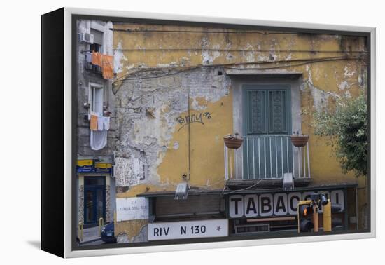 Weather and Sun-Beaten Corner Facade of a Residence on Top of a Shop, Naples, Campania, Italy-Natalie Tepper-Framed Stretched Canvas