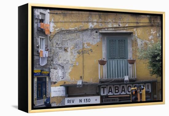 Weather and Sun-Beaten Corner Facade of a Residence on Top of a Shop, Naples, Campania, Italy-Natalie Tepper-Framed Stretched Canvas