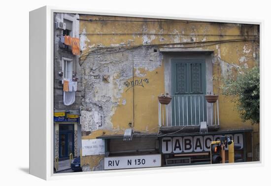 Weather and Sun-Beaten Corner Facade of a Residence on Top of a Shop, Naples, Campania, Italy-Natalie Tepper-Framed Stretched Canvas