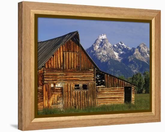 Weathered Wooden Barn Along Mormon Row with the Grand Tetons in Distance, Grand Teton National Park-Dennis Flaherty-Framed Premier Image Canvas