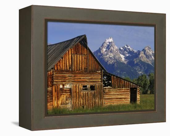 Weathered Wooden Barn Along Mormon Row with the Grand Tetons in Distance, Grand Teton National Park-Dennis Flaherty-Framed Premier Image Canvas